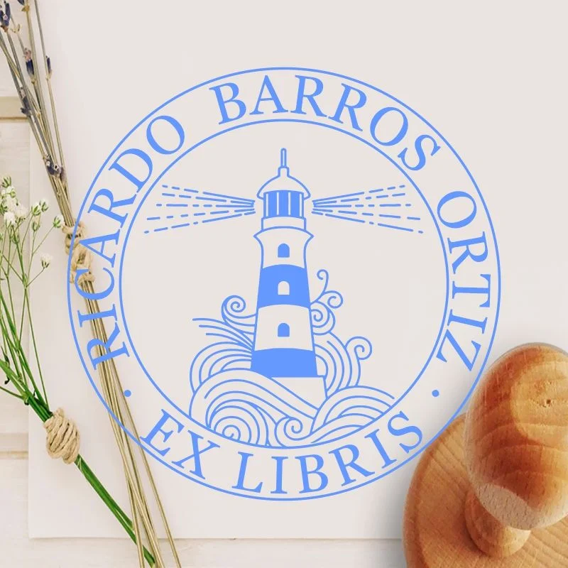 lighthouse illuminating book stamp